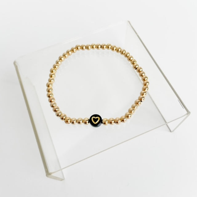 Gold Beaded Bracelet with Black Heart